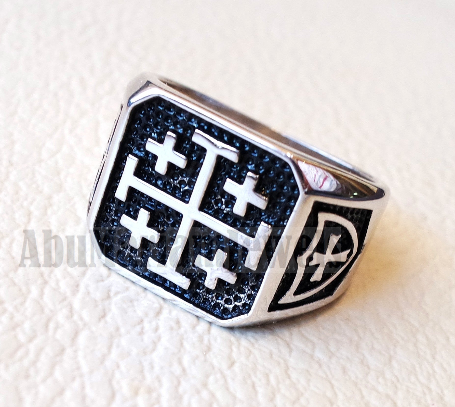 Crucifix discount ring meaning