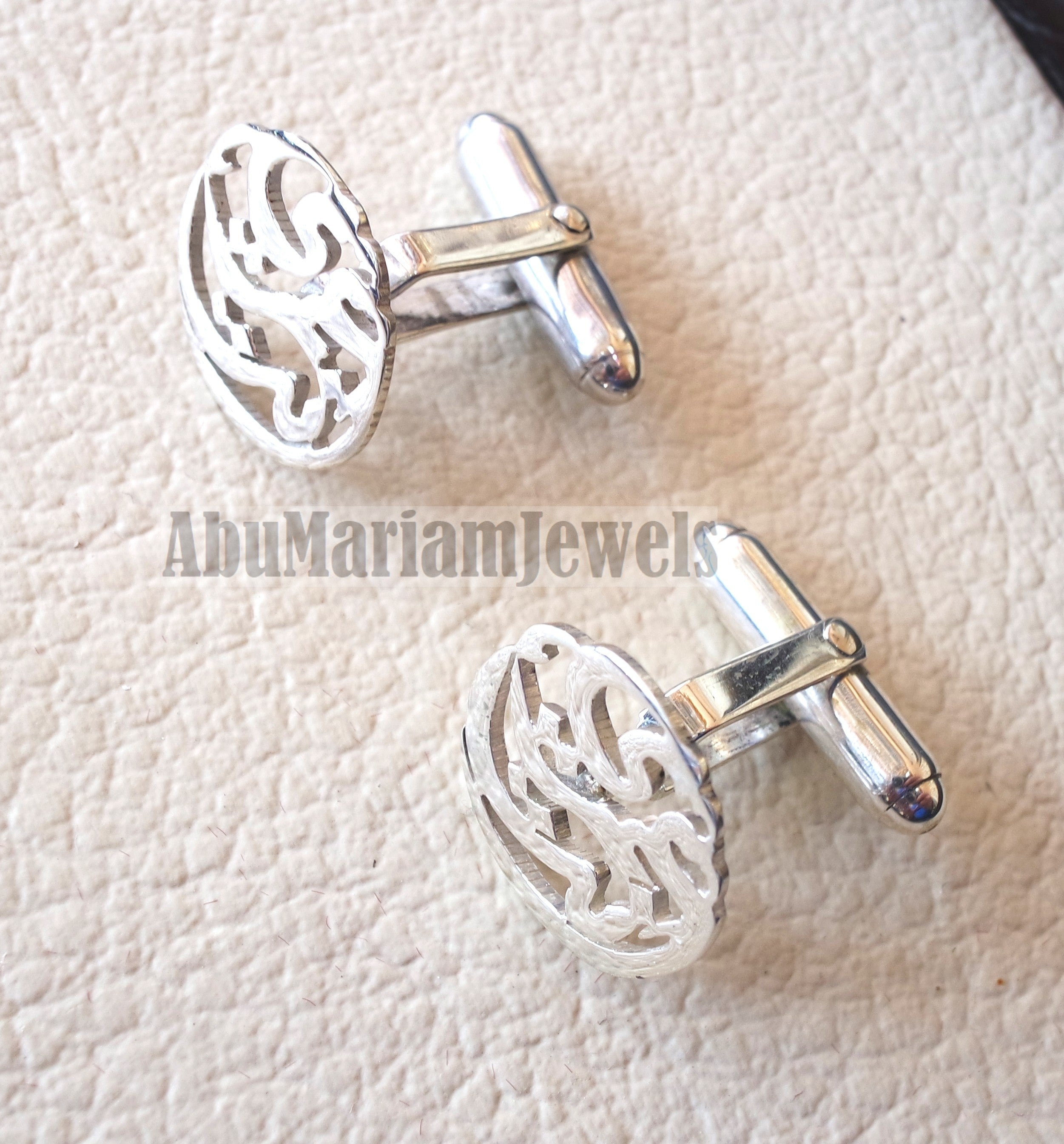 cufflinks , standard size name of two words each calligraphy
