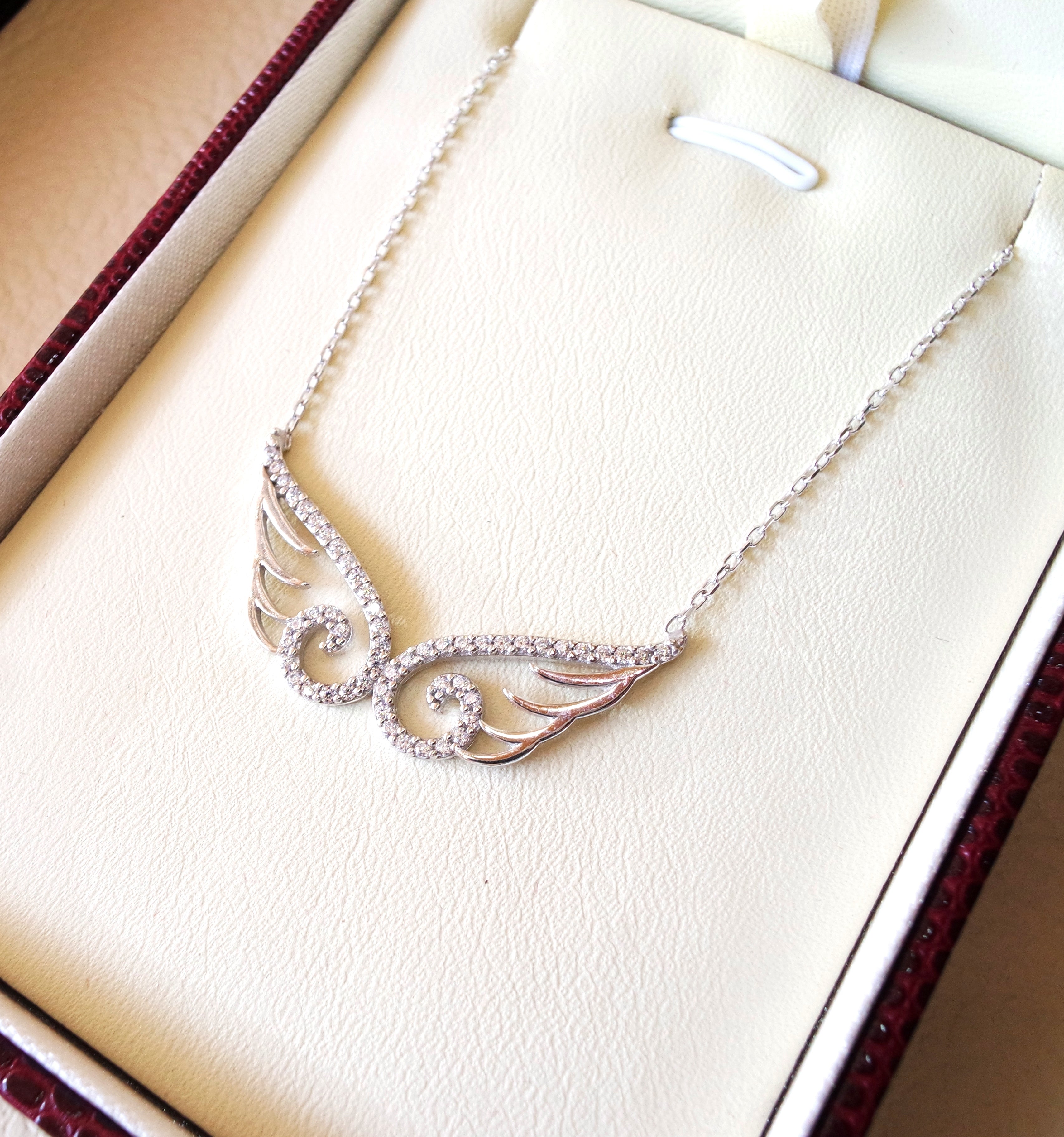 Angel wings sterling silver 925 rhodium plated for durable polish high quality white CZ stones